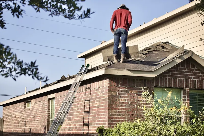 Professional roofer working on a residential roof in Downtown Santa Monica